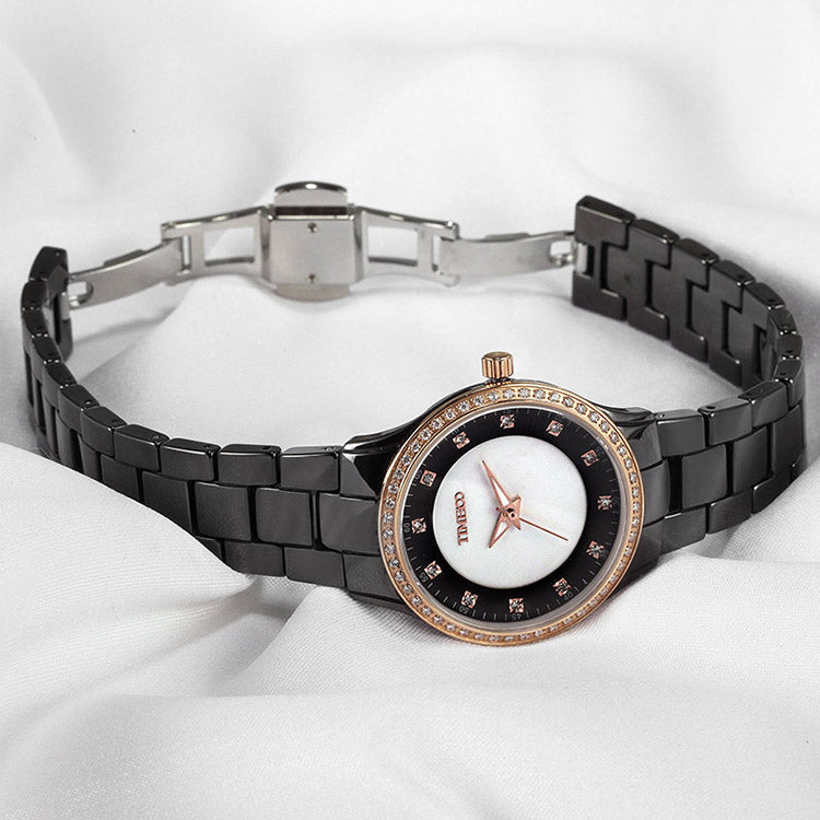 Close-up of the natural shell dial with Austrian crystal hour markers on the TIME100 watch Black - Time100