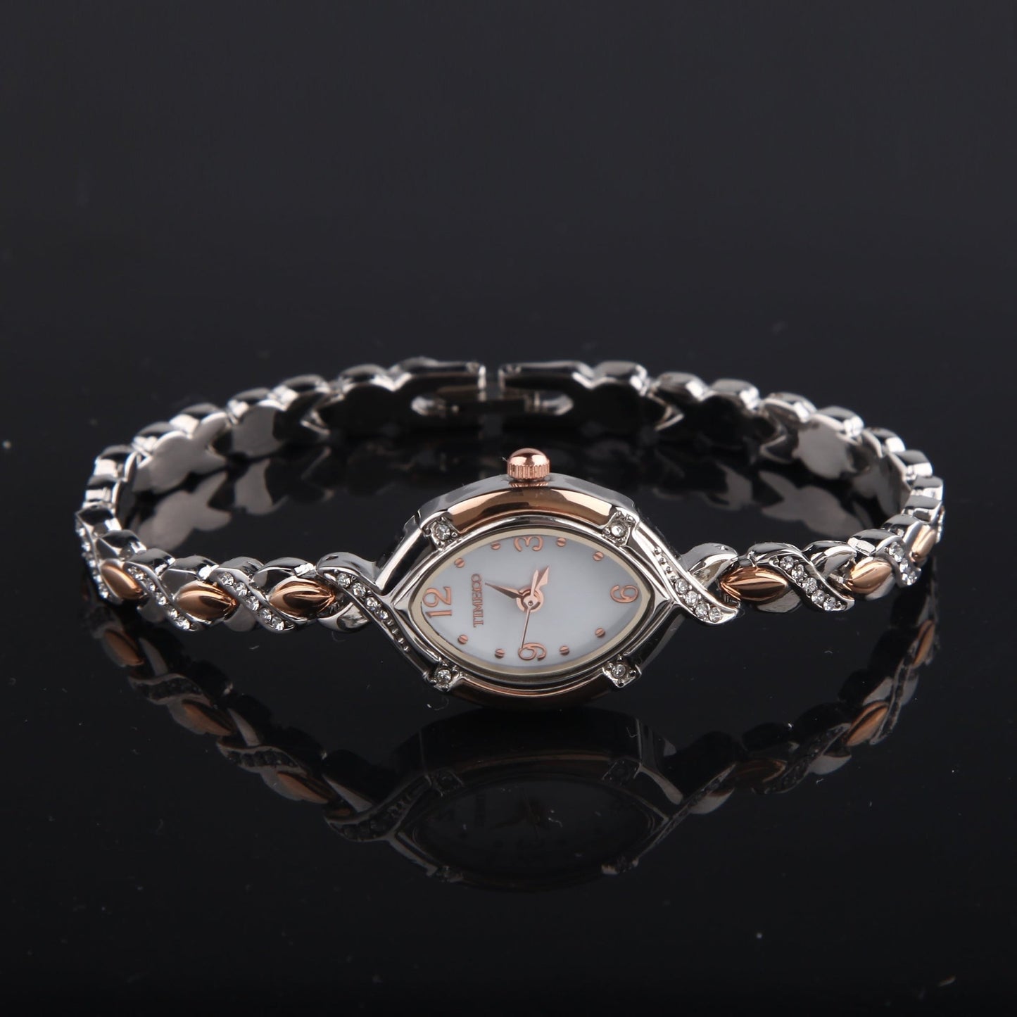 Distinctive rose gold-tone oval case design of the TIME100 Soho women's timepiece five - Time100