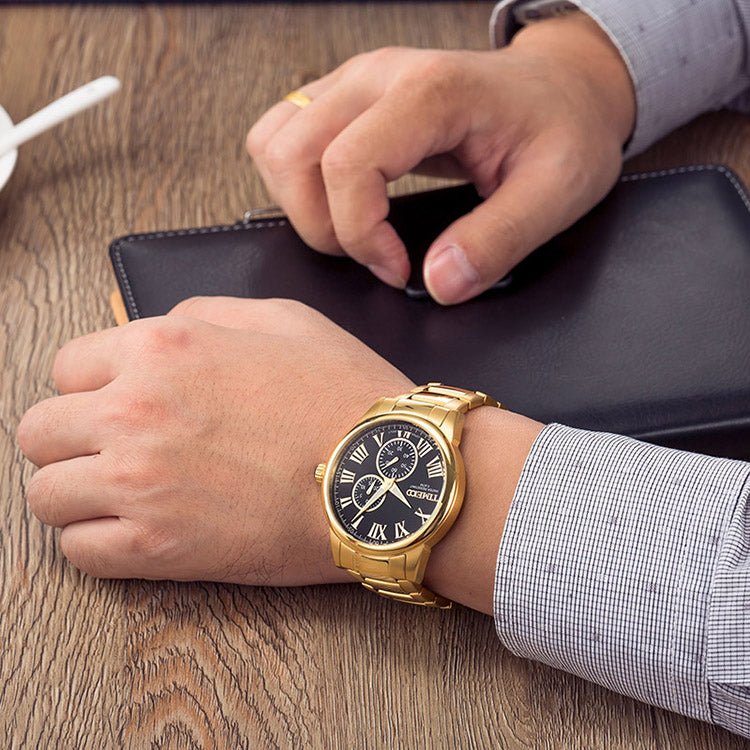 Sophisticated gentleman wearing the TIME100 radiant gold-tone artistic watch with oriental aesthetics Gold Black - Time100