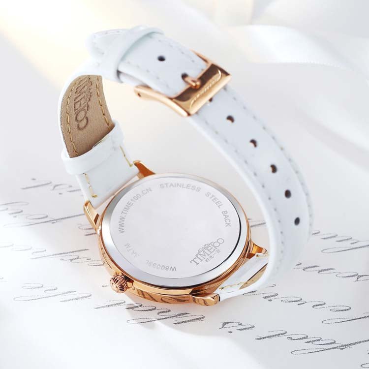 Romantic aesthetic showcasing the TIME100 diamond accent quartz watch for a casual evening event White - Time100