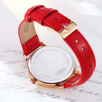 Romantic aesthetic showcasing the TIME100 diamond accent quartz watch for a casual evening event Red - Time100