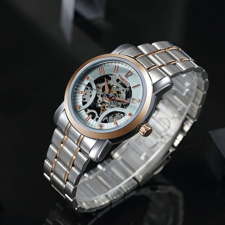 Close-up of the intricate mechanical engraving and skeleton dial on the TIME100 futuristic watch Gold - Time100