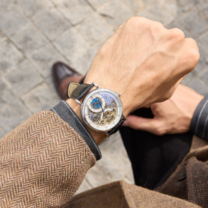 Professional man wearing the bold oversized TIME100 skeleton watch with a business suit Brown - Time100