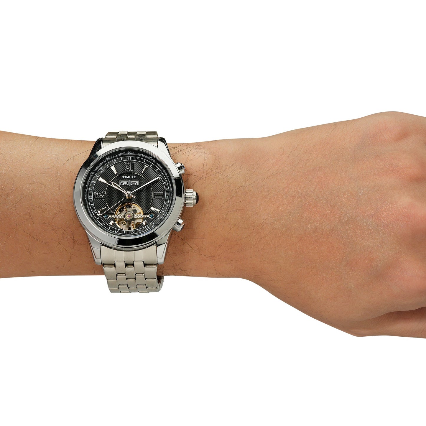 Modern professional man wearing the sophisticated TIME100 stainless steel skeleton watch with a business suit Silver Black