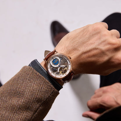 Professional man wearing the bold oversized TIME100 skeleton watch with a business suit Black - Time100