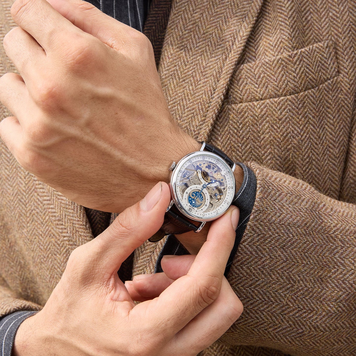 Professional man wearing the bold oversized TIME100 skeleton watch with a business suit White - Time100
