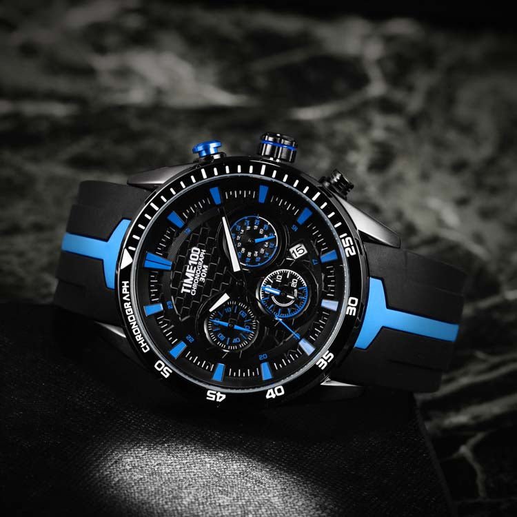 Youthful man styling the vibrant red TIME100 watch with casual street fashion and athleisure attire Blue - Time100
