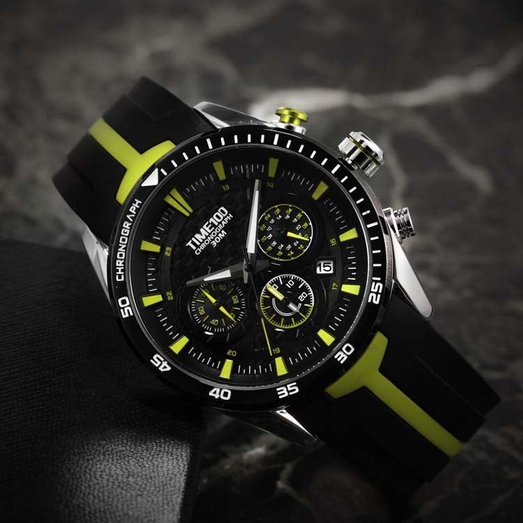 Youthful man styling the vibrant red TIME100 watch with casual street fashion and athleisure attire Green - Time100