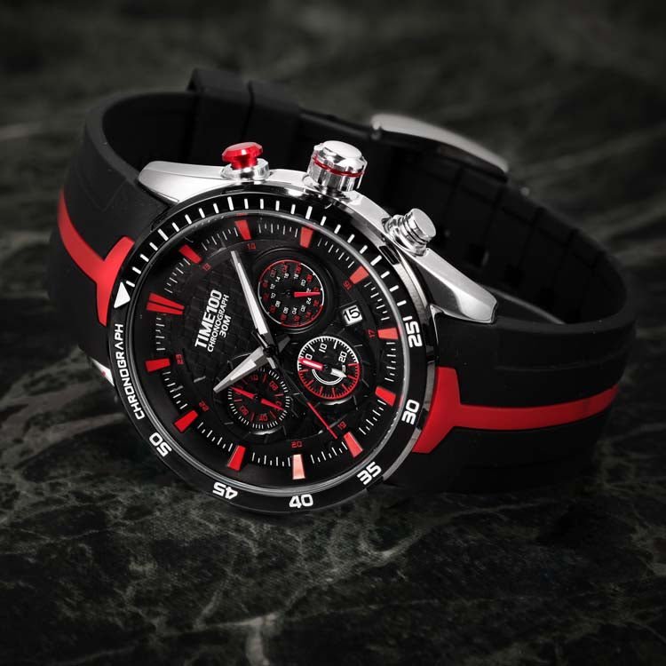 Youthful man styling the vibrant red TIME100 watch with casual street fashion and athleisure attire Red - Time100