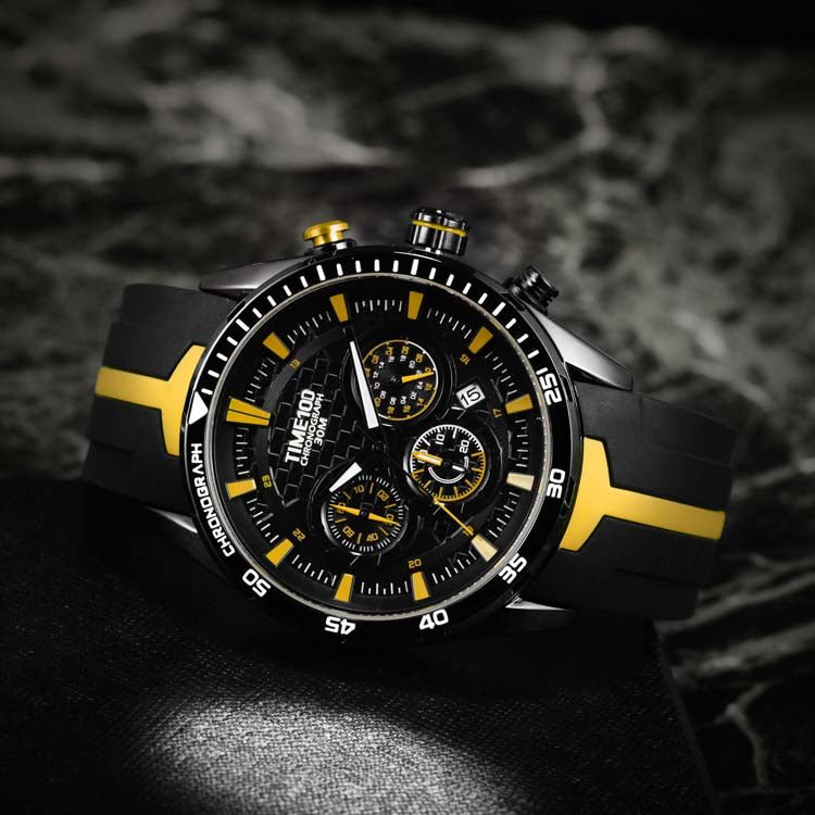 Youthful man styling the vibrant red TIME100 watch with casual street fashion and athleisure attire Yellow - Time100