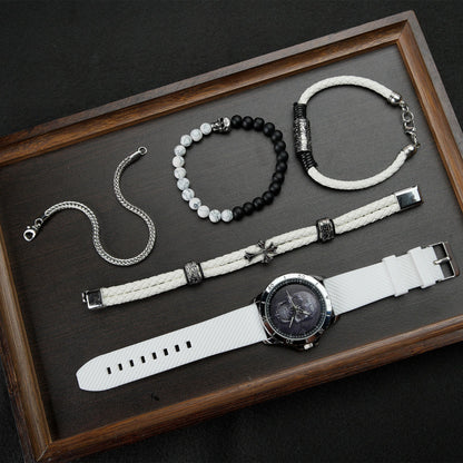 Close-up of the easy-to-read TIME100 black skull dial and precision quartz movement White - Time100