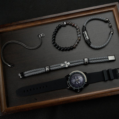 Close-up of the easy-to-read TIME100 black skull dial and precision quartz movement Black - Time100