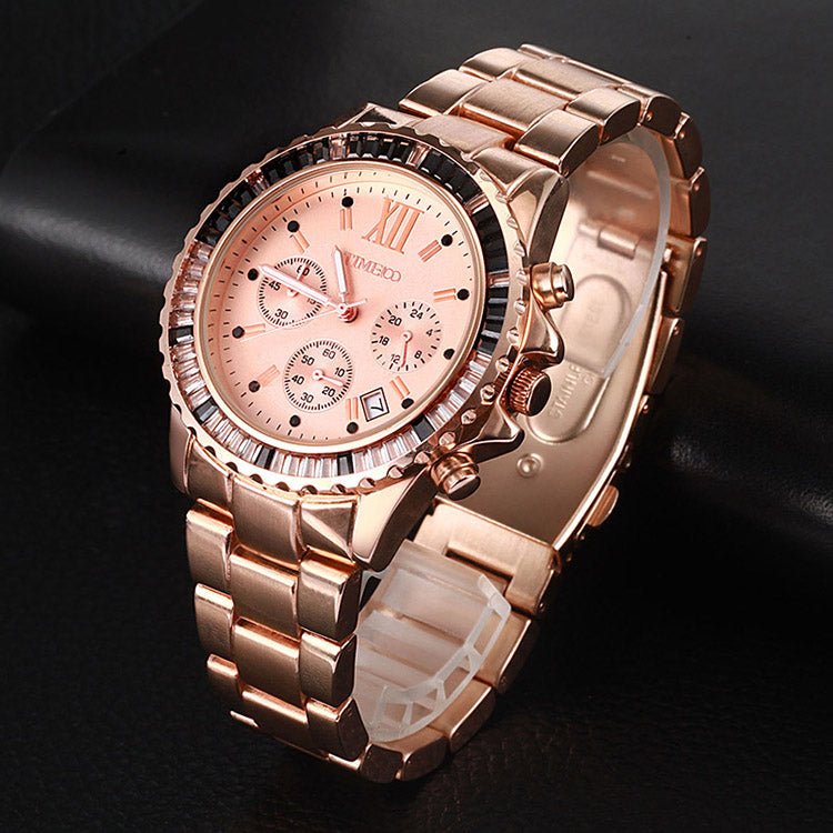 Radiant gold watch dial featuring a modern crosshair face style and precision movement Rose Gold - Time100