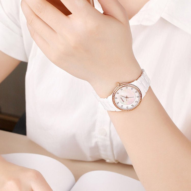 Modern professional woman wearing the black ceramic TIME100 watch with business attire White - Time100