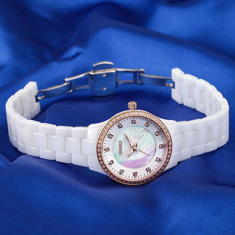 Close-up of the natural shell dial with Austrian crystal hour markers on the TIME100 watch White - Time100