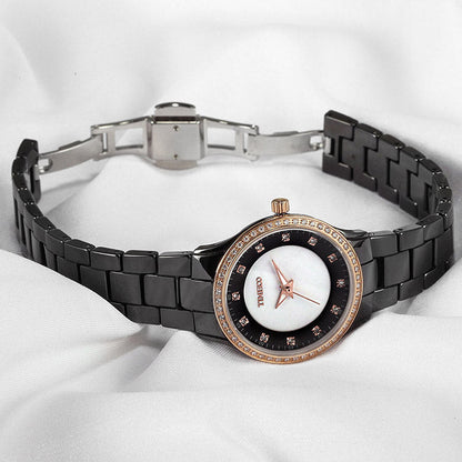 Close-up of the natural shell dial with Austrian crystal hour markers on the TIME100 watch Black - Time100