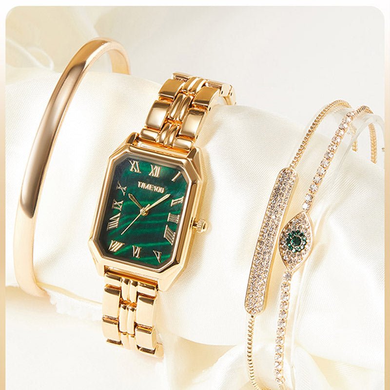 Detail of the three matching gold-tone stacking bracelets with adjustable jewelry clasps included in the set Gold - Time100