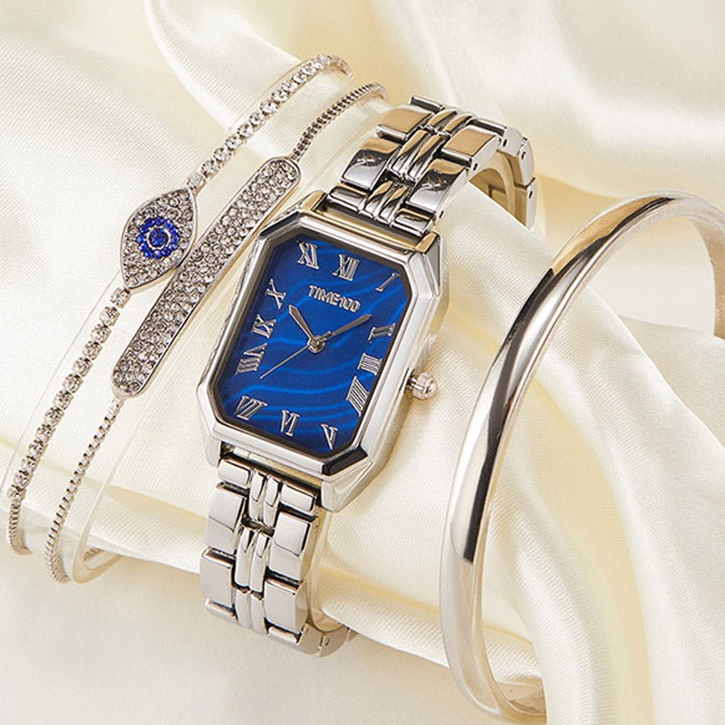Detail of the three matching gold-tone stacking bracelets with adjustable jewelry clasps included in the set Silver - Time100