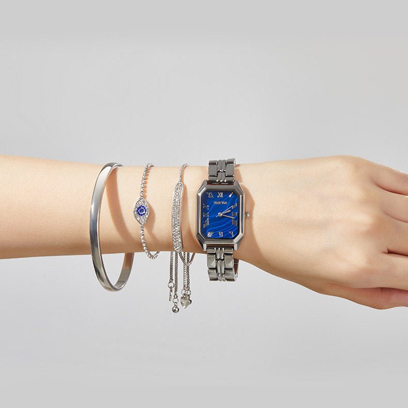 Professional woman styling the vintage emerald green rectangle watch for a minimalist office look Silver - Time100