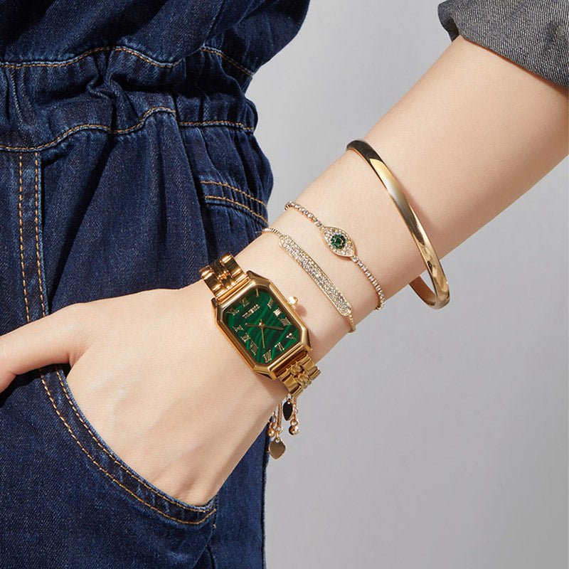 High-fashion aesthetic showing the emerald green watch layered with gold bracelets for a social event Gold - Time100