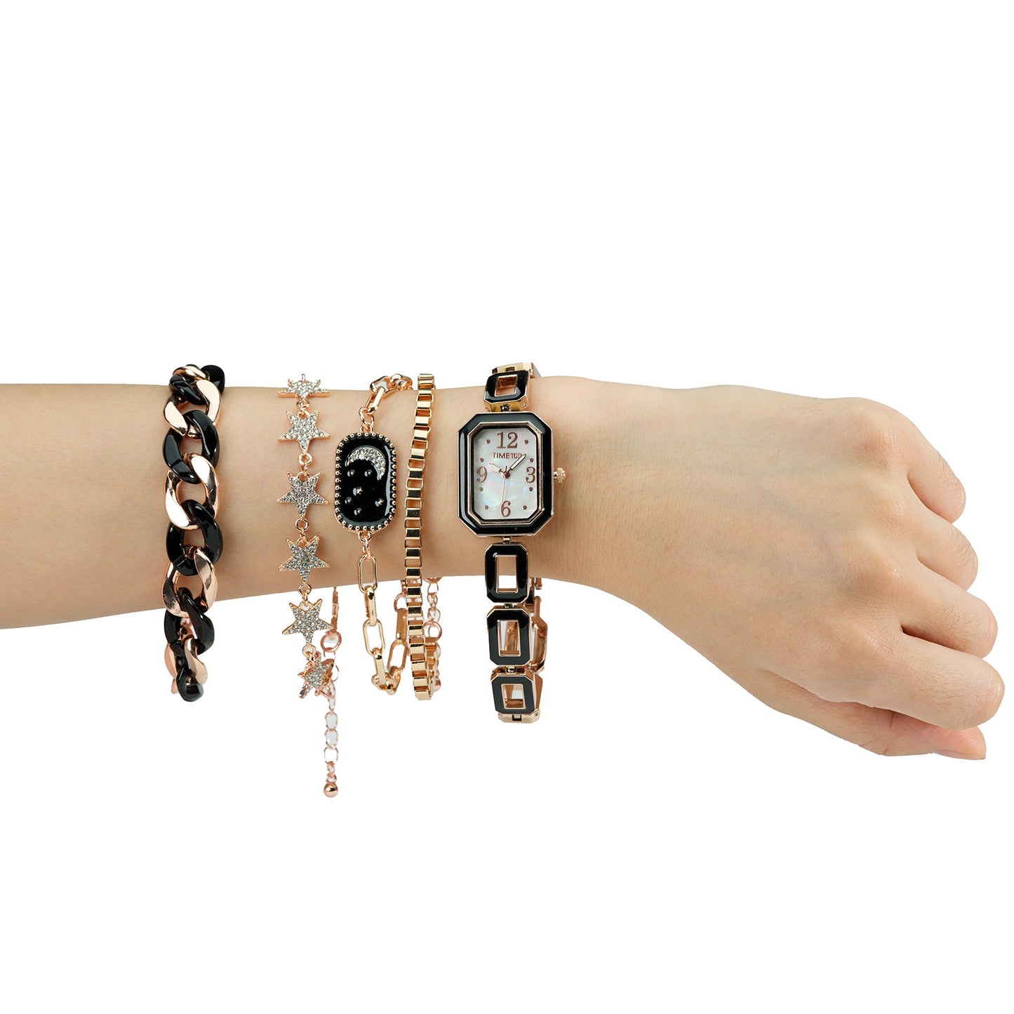 Detail of the four stackable geometric metal alloy bracelets included in the TIME100 jewelry set Black - Time100