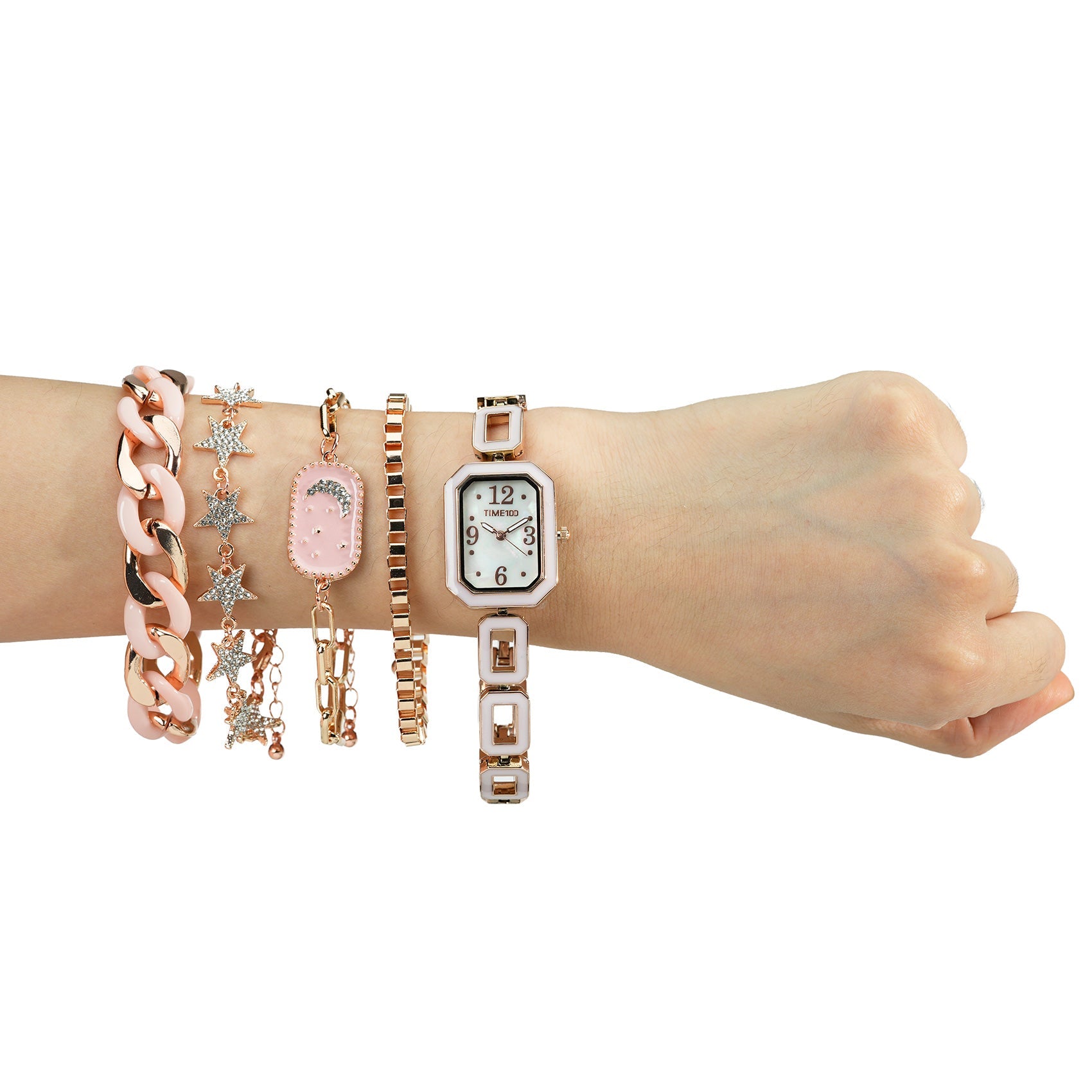 Detail of the four stackable geometric metal alloy bracelets included in the TIME100 jewelry set Pink - Time100