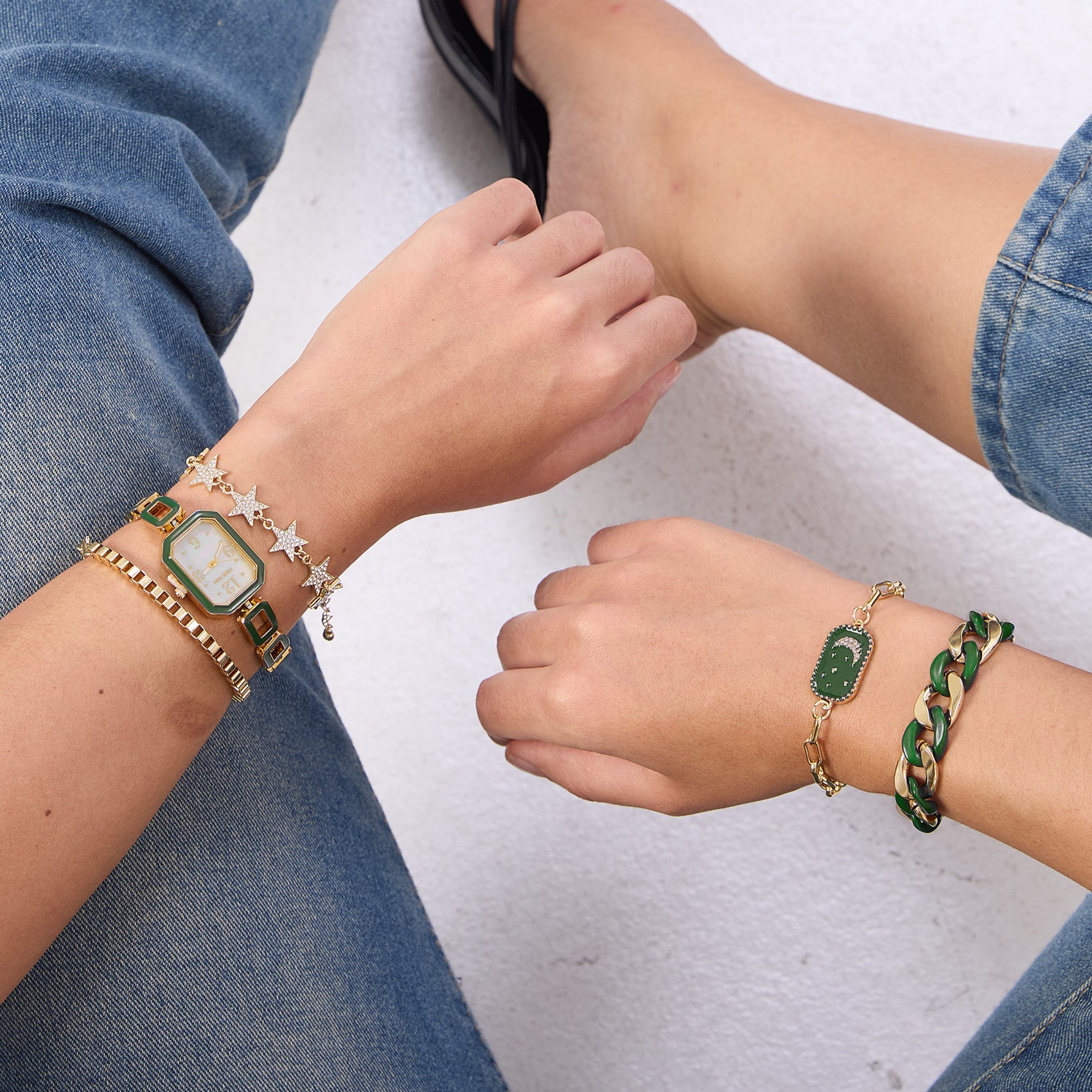 Glamorous evening look featuring the TIME100 rectangular watch stacked with four matching bracelets Green - Time100