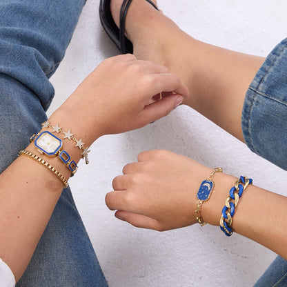 Glamorous evening look featuring the TIME100 rectangular watch stacked with four matching bracelets Blue - Time100