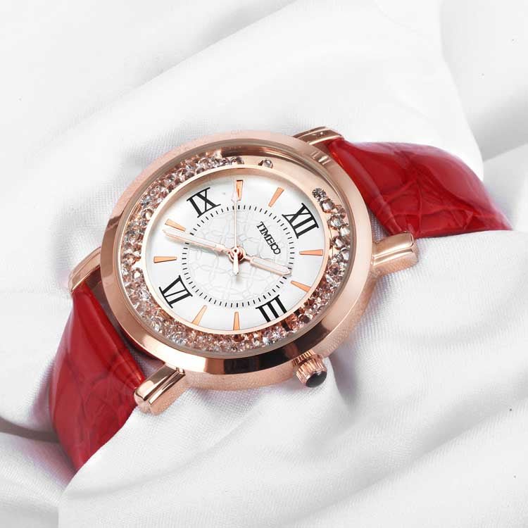 Close-up of the elegant purple dial featuring easy-to-read Roman numerals and a crystal-encrusted bezel Red - Time100