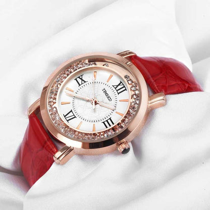 Close-up of the elegant purple dial featuring easy-to-read Roman numerals and a crystal-encrusted bezel Red - Time100
