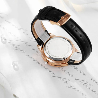 Close-up of the clean analog dial, crystal embellishments, and high-hardness mineral glass on the watch Black - Time100