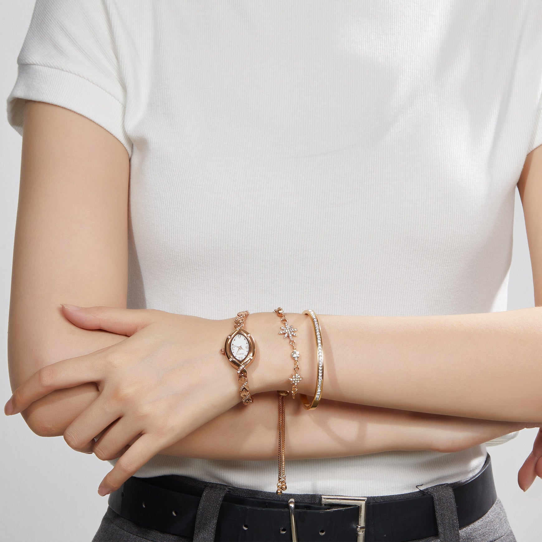 Detail of the elegant rose gold-tone matching bracelets from the TIME100 Chelsea jewelry collection Gold2 - Time100