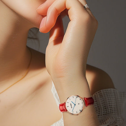 Detail of the black genuine leather strap with an embossed matte lizard pattern on the TIME100 timepiece Red - Time100